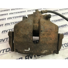 Тормозной суппорт передний левый VW Volkswagen Passat B7 1K0615123E